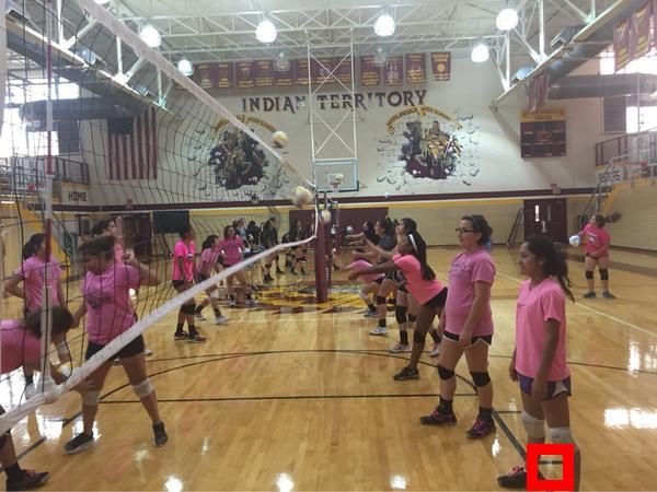 kids in gym with highlighted face (which isn't one of the kids)